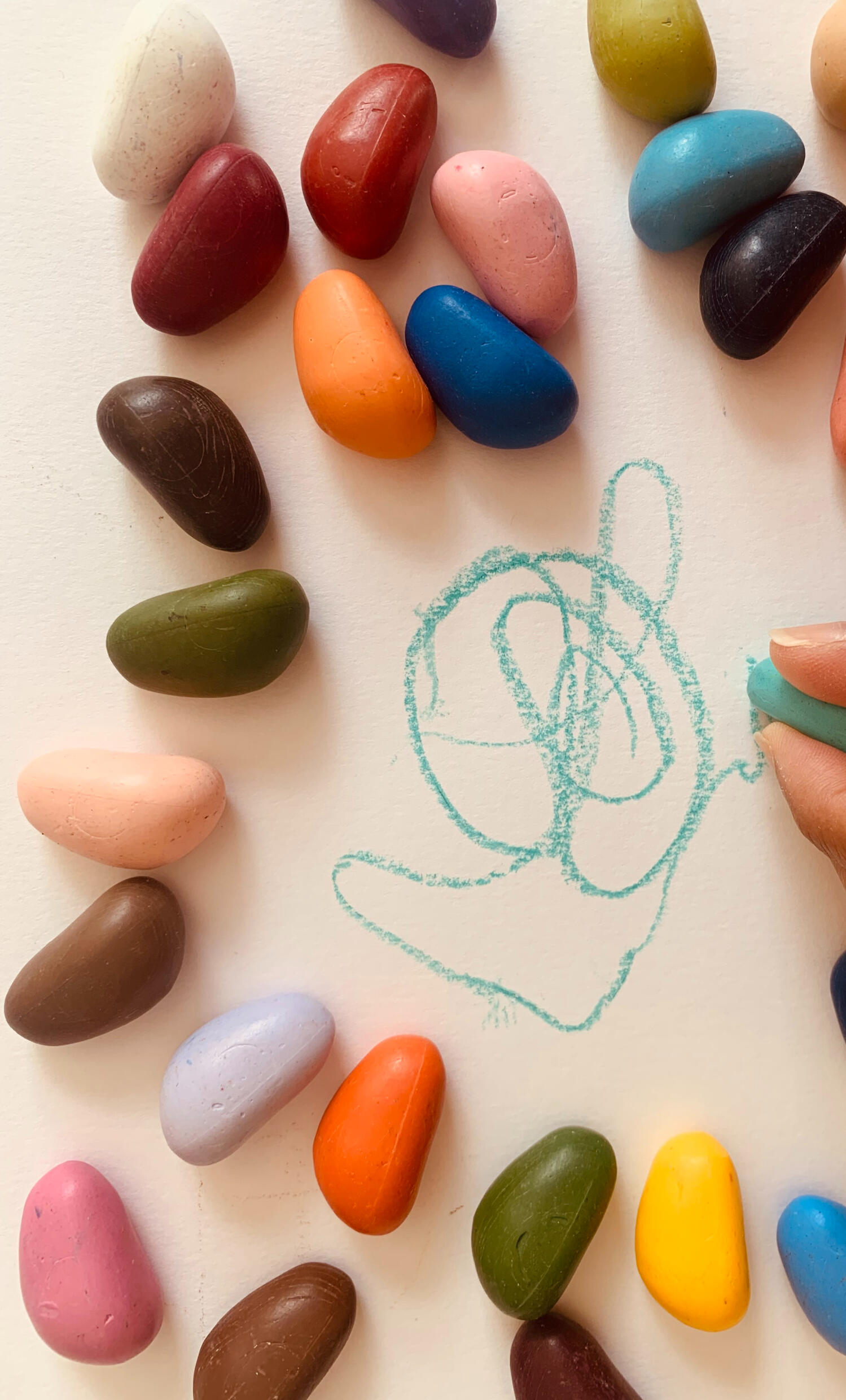 Diwa art therapy - hand making marks with oval crayons